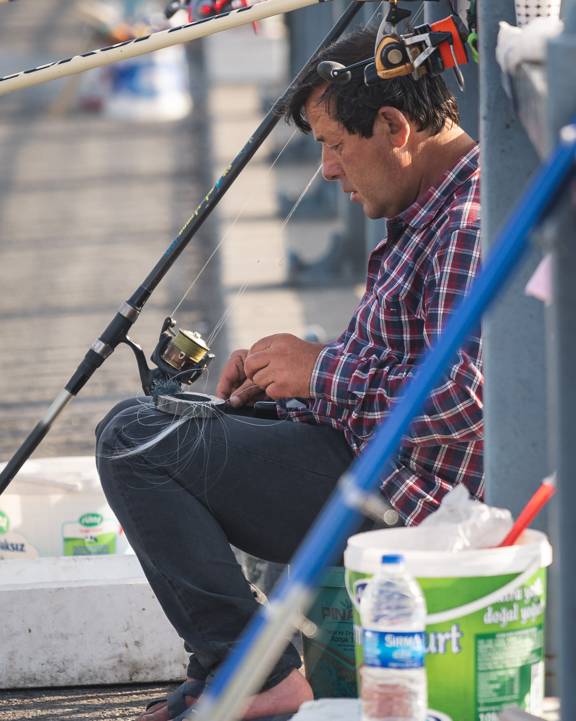 fisherman on galata bridge in Istanbul