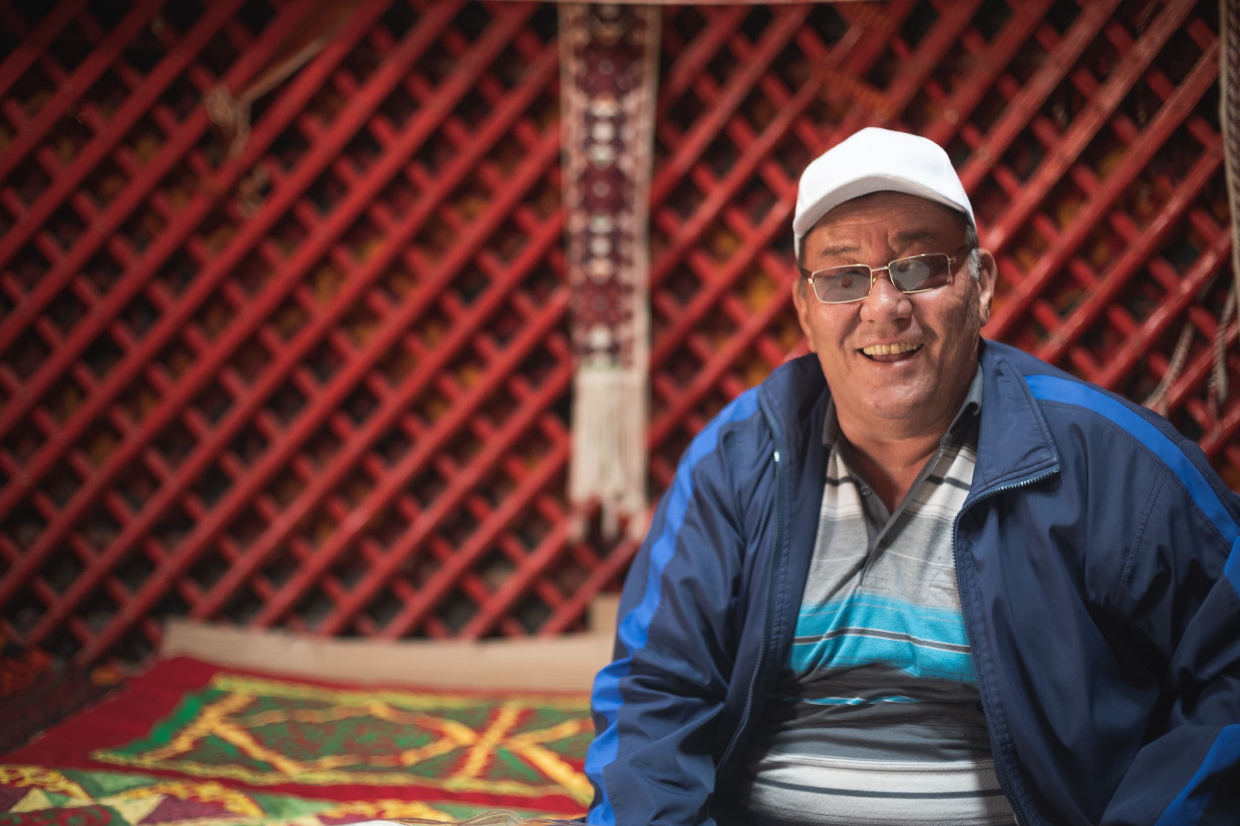 Kazakh man in a traditional yurt