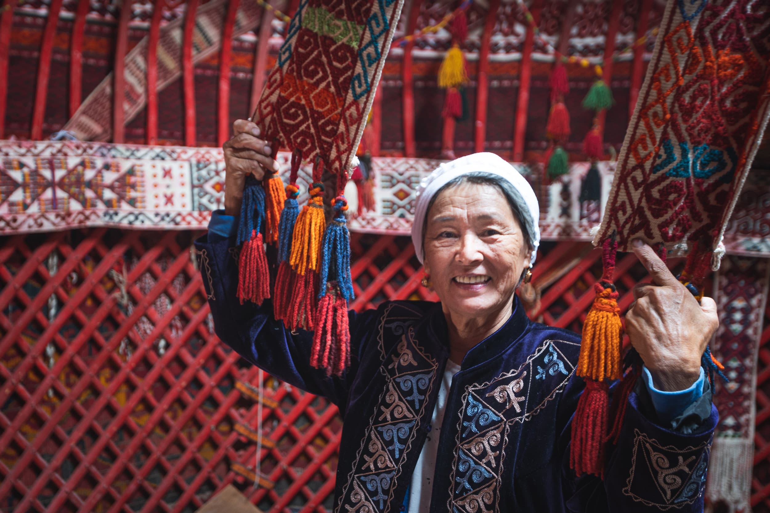 Kazakh woman showing their yurt